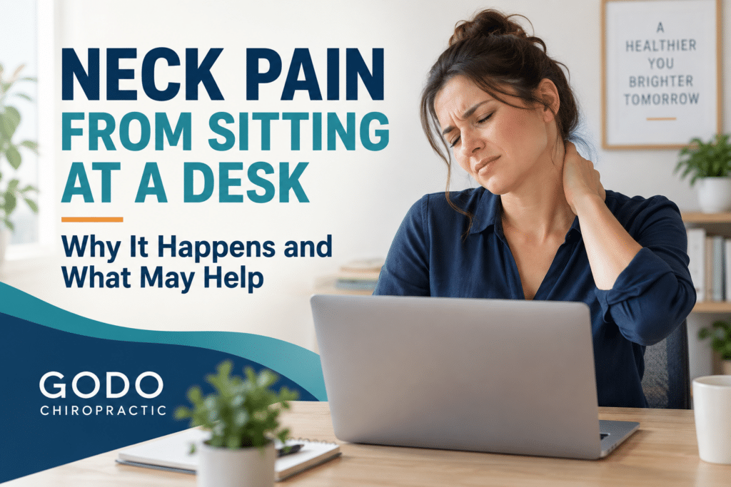 Person with neck pain while sitting at a computer desk